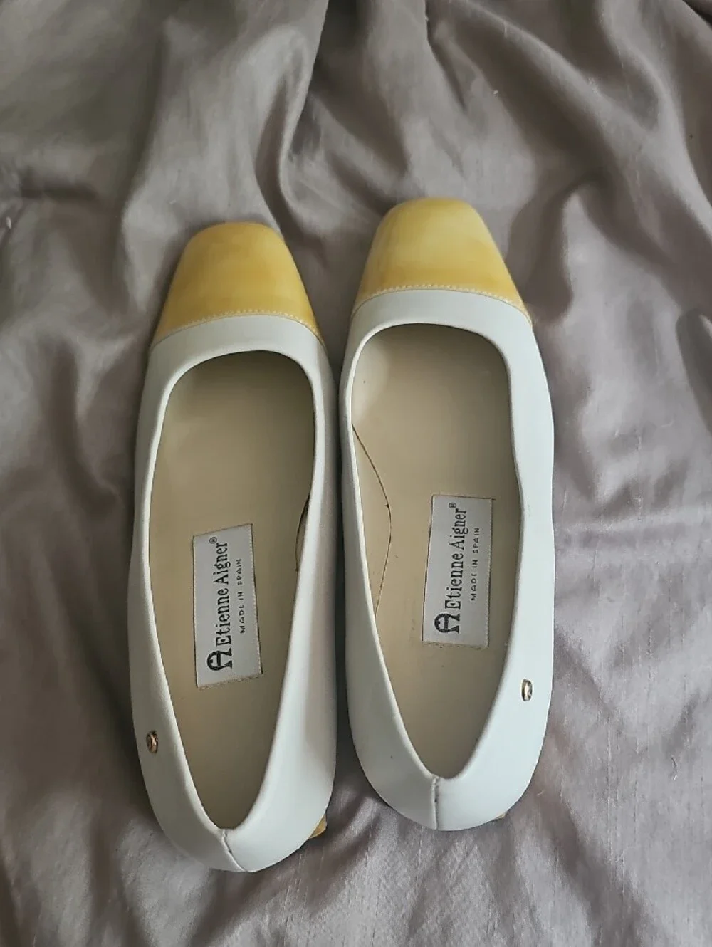 Etienne Aigner White Flats with Yellow Patent Cap Toe Accent